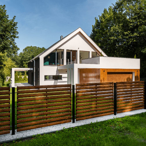 Modern craftsman bungalow with short aluminum and wood blend fence